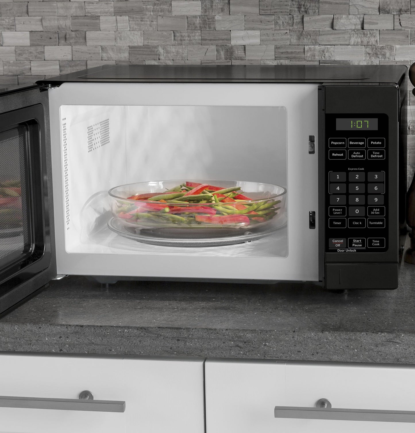 GE® 0.7 Cu. Ft. Capacity Countertop Microwave Oven